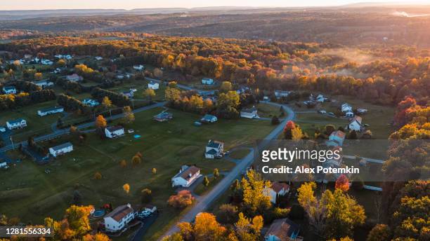 sunset over the small american town in mountains. - pennsylvania stock pictures, royalty-free photos & images
