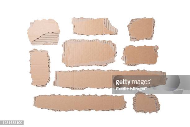 torn cardboard pieces collection - cardboard stock pictures, royalty-free photos & images