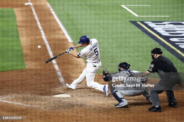 Corey Seager of the Los Angeles Dodgers hits a solo home run against the Tampa Bay Rays during the eighth inning in Game Two of the 2020 MLB World...