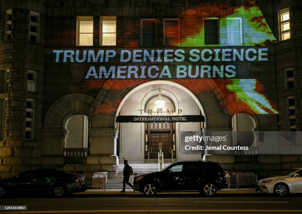 Activists Protest Trump's Response To Science And Climate Change As Wildfires Burn Across The Country