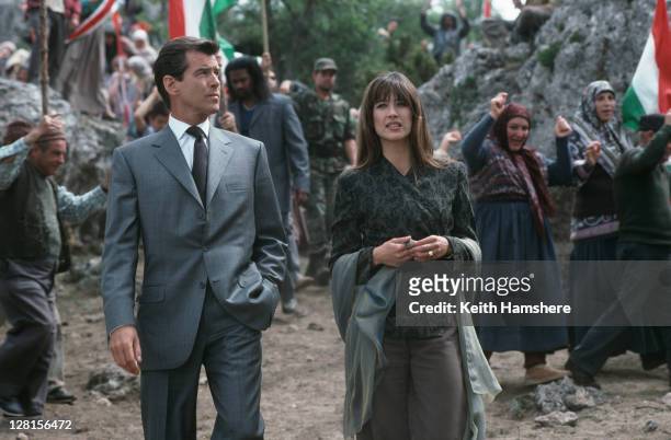Irish actor Pierce Brosnan stars as 007 opposite French actress Sophie Marceau as Elektra King in the James Bond film 'The World Is Not Enough',...