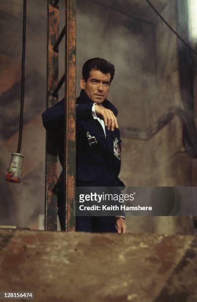 Irish actor Pierce Brosnan as 007 in the James Bond film 'The World Is Not Enough', 1999. Here he poses as a Russian scientist in order to visit a...