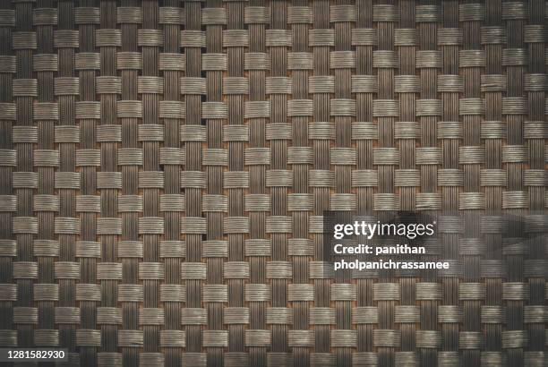 close up weaving material floor texture . - woven grass mat stock pictures, royalty-free photos & images
