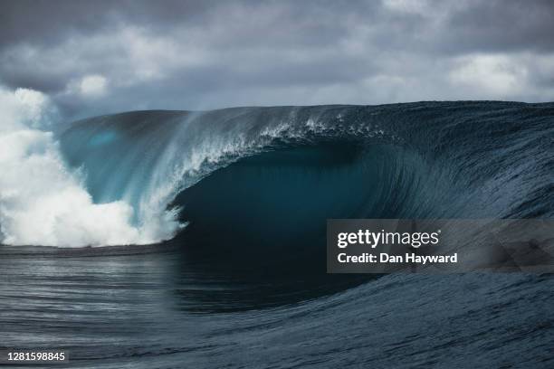 teahupoo wave - tube wave stock pictures, royalty-free photos & images