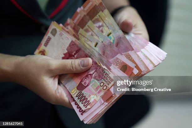 1,023 Indonesian Rupiahs Stock Photos, High-Res Pictures, and Images ...