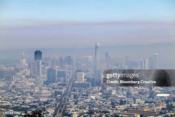 smoke covers the san francisco skyline - skog stock pictures, royalty-free photos & images