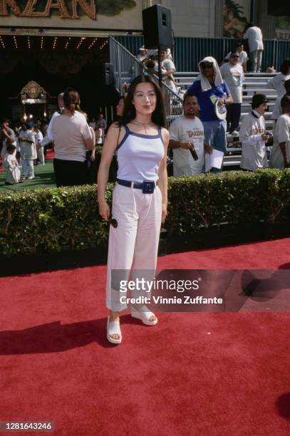 Macau-born actress Ming-Na Wen attends the premiere of 'Tarzan' held at the El Capitan Theatre in Los Angeles, California, 12th June 1999.