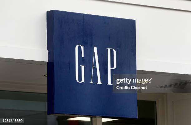 Logo is seen on the facade of a store on October 22, 2020 in Paris, France. The US ready-to-wear brand GAP wishes to review its strategy in Europe,...