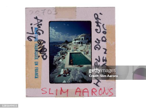 Guests round the swimming pool at the Hotel du Cap Eden-Roc, Antibes, France, August 1976.