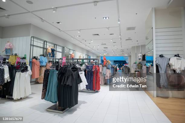 clothing store retail display in shopping mall - womenswear stock pictures, royalty-free photos & images