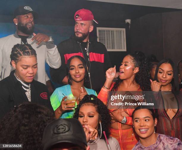 Young M.A., Ayisha Diaz, DJ Drama and Yasmine Lopez attend Chaos Tuesday Nights at Red Martini on October 20, 2020 in Atlanta, Georgia.