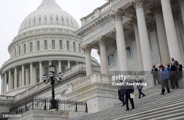 Democratic members of U.S. Senate Judiciary Committee, led by Senate Minority Leader Sen. Chuck Schumer , walk down the east front steps of the U.S....