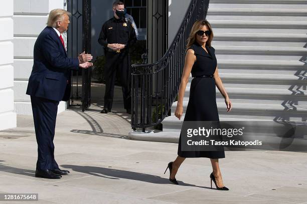 President Donald Trump and First Lady Melania Trump walk to the South Lawn to depart the White House on October 22, 2020 in Washington, DC. President...