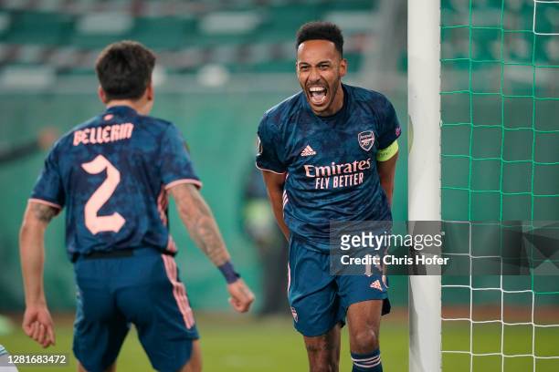 Pierre-Emerick Aubameyang of Arsenal celebrates with team mate Hector Bellerin after scoring his sides second goal during the UEFA Europa League...