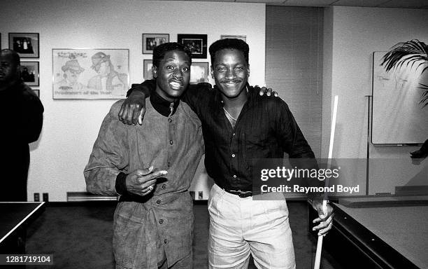 Singer Johnny Gill and 'Video Soul' host Donnie Simpson poses for photos during the opening of Flyte Tyme Studios in Edina, Minnesota in September...