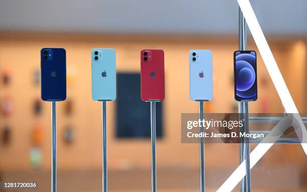 Line up of the new Apple iPhone 12 inside the window of the Apple Store in George Street on October 23, 2020 in Sydney, Australia. The iPhone 12...