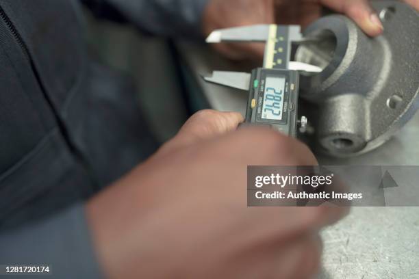 Worker Using Calipers 2,700 Caliper Stock Photos, High-Res Pictures, and Images - Getty Images