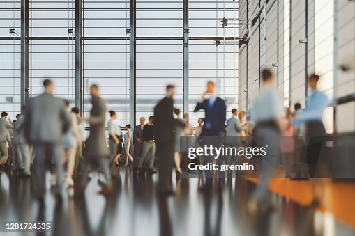 Large group of business people in convention centre Large group of business people in convention centre