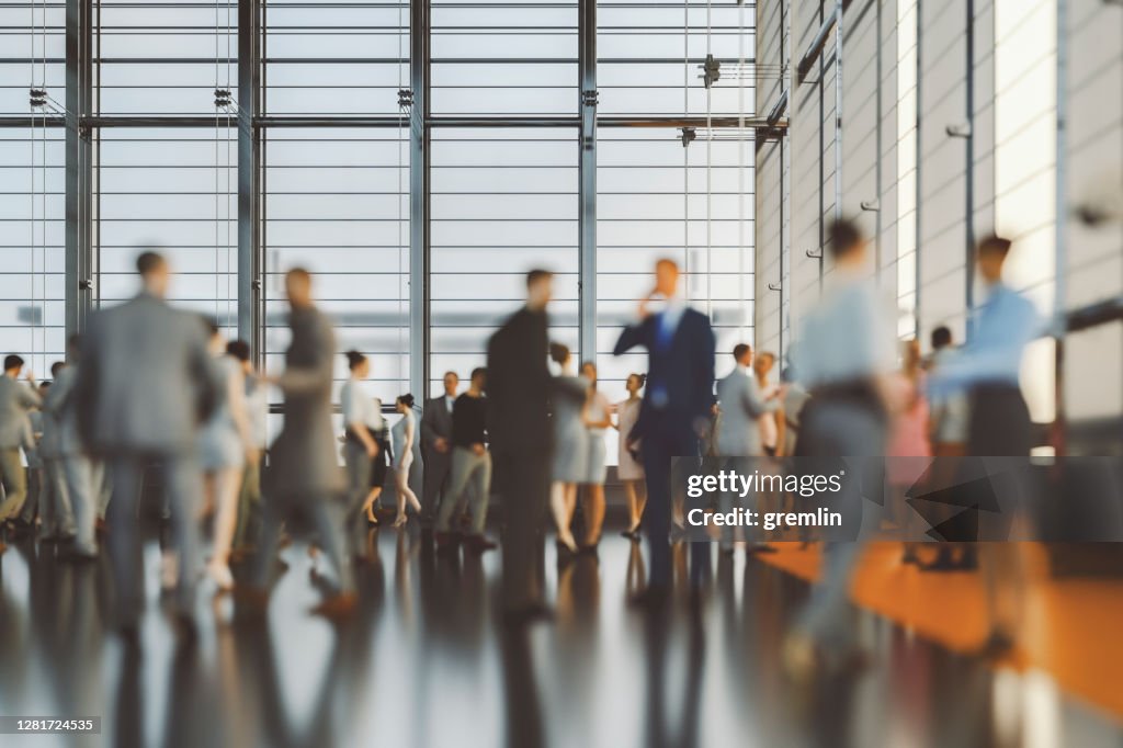 Large group of business people in convention centre