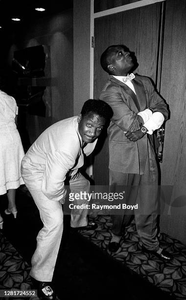 Video Soul' host Donnie Simpson and Jerome Benton of The Time poses for photos during the opening of Flyte Tyme Studios in Edina, Minnesota in...