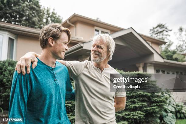 proud father and son - grandpa son stock pictures, royalty-free photos & images