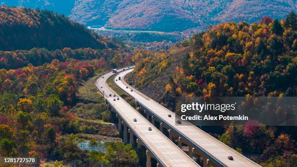 aerial view of the high bridge at the pennsylvania turnpike on a sunny day in fall. - mount pocono pennsylvania stock pictures, royalty-free photos & images