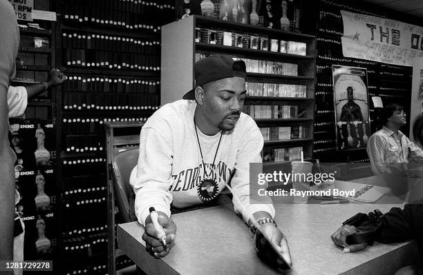 Rapper The D.O.C. Signs autographs and greets fans at Metro Music in Chicago, Illinois in October 1989.