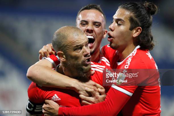Andrés D'Alessandro of Internacional celebrates with teammates after scoring the first goal of his team during a Group E match of Copa CONMEBOL...