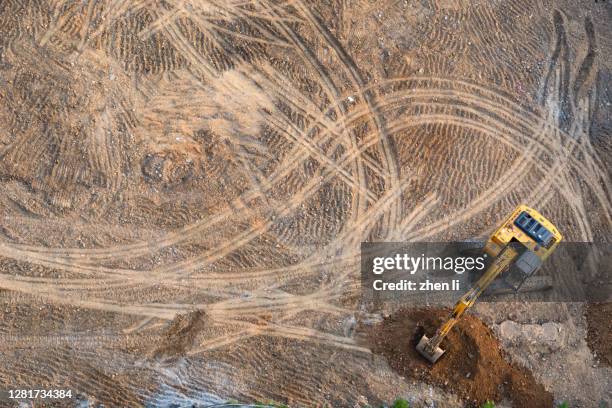 aerial photography of excavators and trucks in operation - mining from above stock pictures, royalty-free photos & images