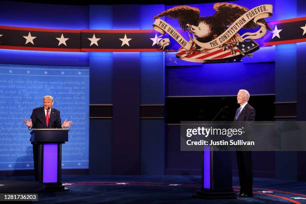 President Donald Trump and Democratic presidential nominee Joe Biden participate in the final presidential debate at Belmont University on October...