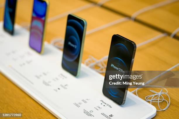 The new iPhone 12 and iPhone 12 Pro on display during launch day on October 23, 2020 in London, England. Apple's latest 5G smartphones go on sale in...