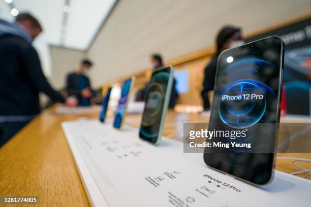 The new iPhone 12 and iPhone 12 Pro on display during launch day on October 23, 2020 in London, England. Apple's latest 5G smartphones go on sale in...