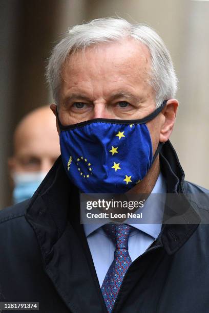 Brexit negotiator Michel Barnier walks with members of the EU delegation to the Department for Business, Energy and Industrial strategy in St. James...