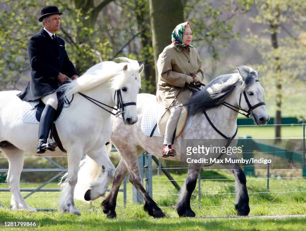 Queen Elizabeth II seen horse riding in the grounds of Windsor Castle on April 17, 2006 in Windsor, England.