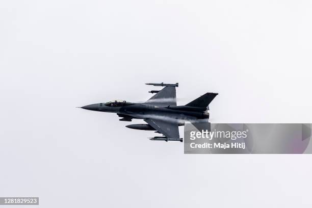 An F-16 jet flies on October 22, 2020 in Spangdahlem, Germany. Spangdahlem is home to a United States Air Force base whose future is uncertain...