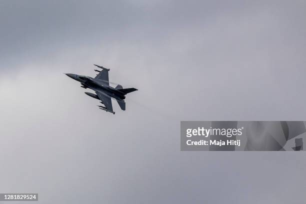 An F-16 jet flies on October 22, 2020 in Spangdahlem, Germany. Spangdahlem is home to a United States Air Force base whose future is uncertain...