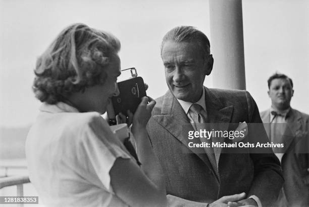 American actor, dancer and singer Clifton Webb has his picture taken on the deck of an ocean liner, circa 1950.