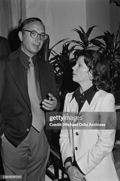 American playwright Neil Simon with his wife, actress Marsha Mason at a party thrown for US Presidential candidate for the Democratic Party Jimmy...