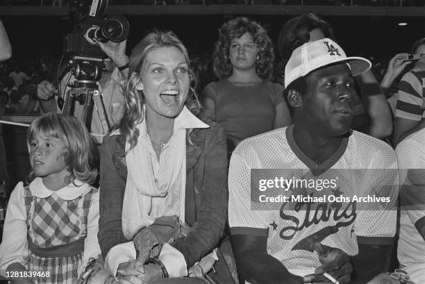 American actress Cathy Lee Crosby and her partner, actor Richard Roundtree at a Los Angeles Dodgers versus celebrities baseball game, Los Angeles,...