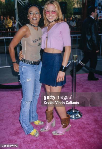 Singer "Scary Spice" Melanie Brown and singer "Sporty Spice" Melanie Chisholm of the Spice Girls attend the "Austin Powers: The Spy Who Shagged Me"...