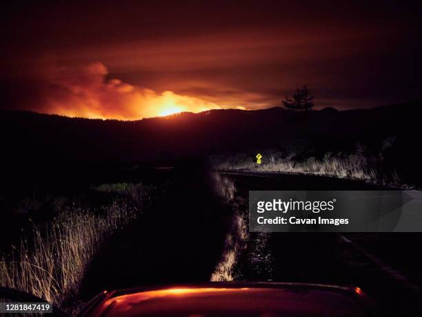 the woodward fire burns in the point reyes national seashore. - national night ストックフォトと画像