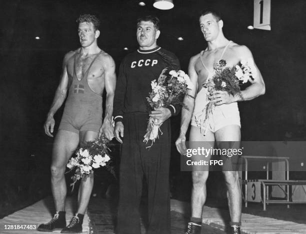 The winners of the freestyle heavyweight wrestling event at the Summer Olympic Games in Helsinki, Finland, 28th July 1952. From left to right, they...