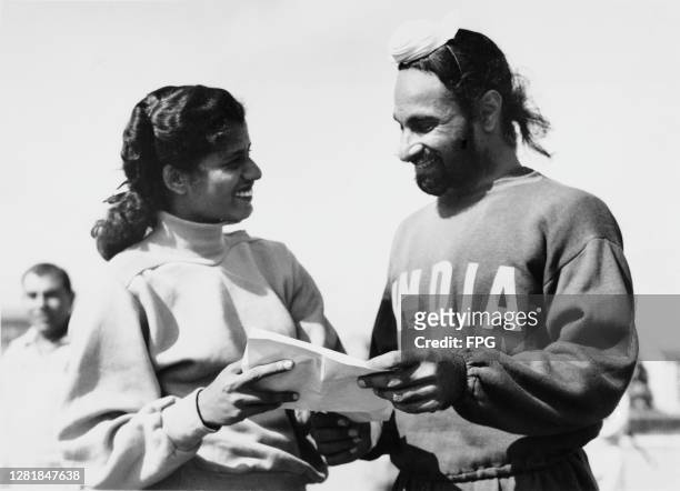 From left to right, Indian competitors Mary D'Souza and Grahanandan 'Nandy' Singh at the Olympic Village during the Summer Olympic Games in Helsinki,...