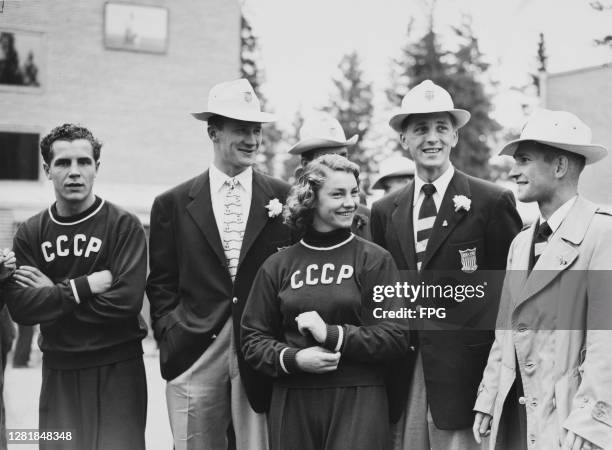 The US team who won the men's eight rowing event visit the Soviet team which came second at their camp at Otaniemi, during the Summer Olympic Games...