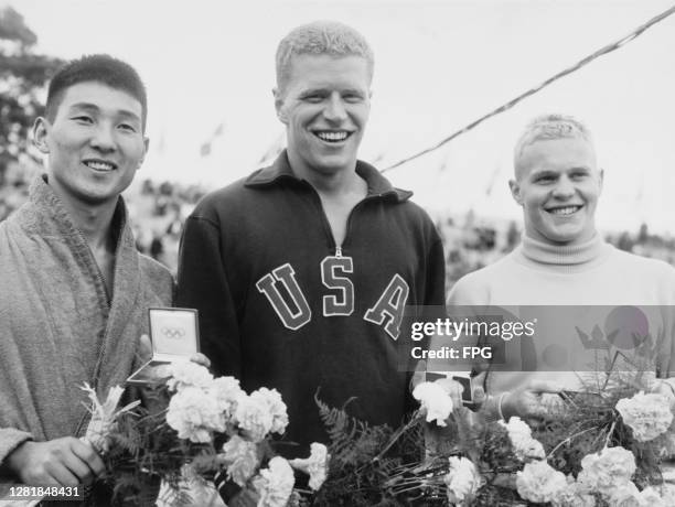 The winners of the men's 100 metres freestyle swimming event at the Summer Olympic Games in Helsinki, Finland, 27th July 1952. From left to right,...