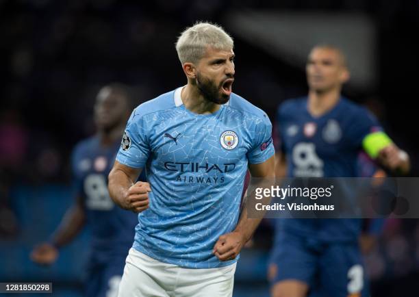 Sergio Aguero of Manchester City celebrates scoring the first goal from a penalty during the UEFA Champions League Group C stage match between...