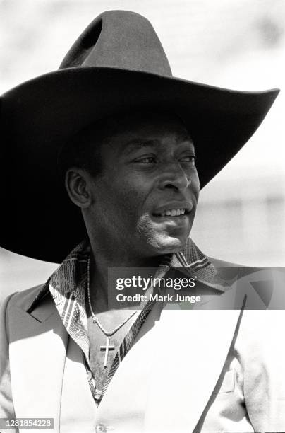 Former standout player Pele wears a cowboy hat while being feted during a soccer game between the Colorado Caribous and the New York Cosmos at Mile...