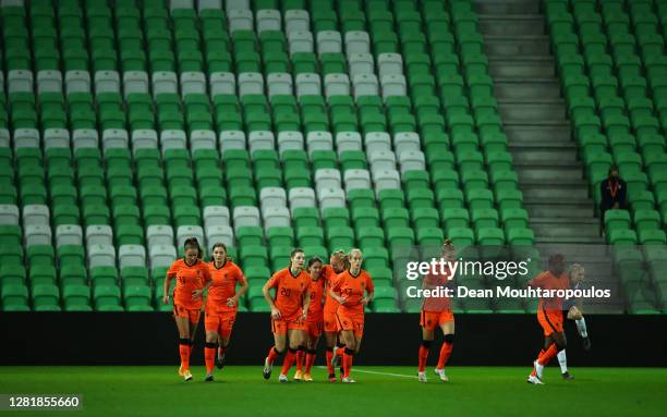 Danielle van de Donk of Netherlands celebrates with teammates after scoring her team's first goal during the UEFA Women's EURO 2022 qualifier match...