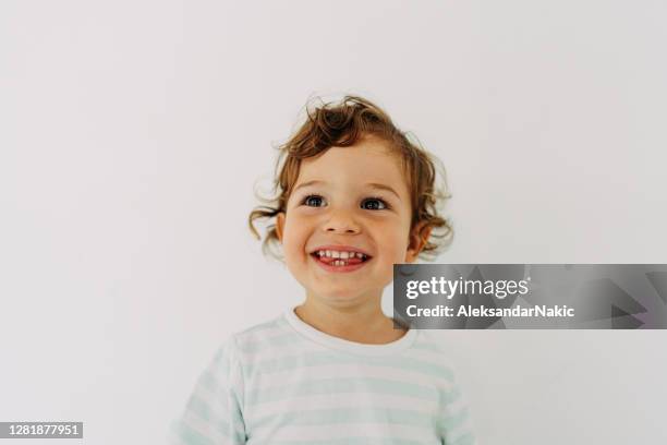 smiling boy's portrait - babies singing stock pictures, royalty-free photos & images