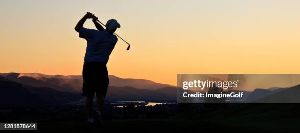 golfer silhouette - golf panoramic stock pictures, royalty-free photos & images